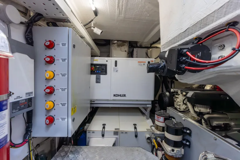  Yacht Photos Pics Engine room of 2021 Azimut S6 Sportfly yacht with Kohler generator and control panel.