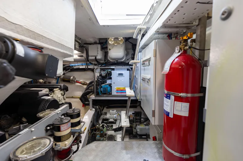  Yacht Photos Pics Engine room of 2021 Azimut S6 Sportfly yacht with equipment and fire extinguisher.