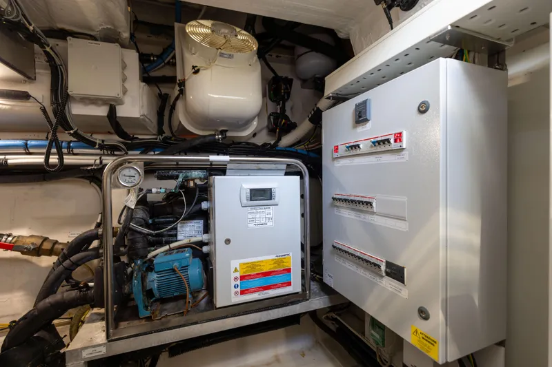  Yacht Photos Pics Engine room of 2021 Azimut S6 Sportfly yacht with electrical panels and machinery.