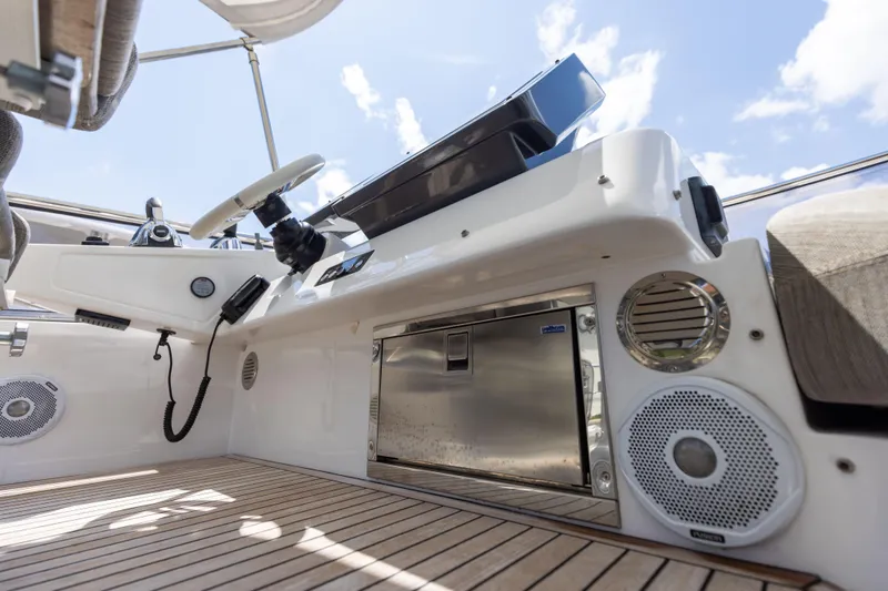  Yacht Photos Pics 2021 Azimut S6 Sportfly yacht interior with modern steering and audio system.