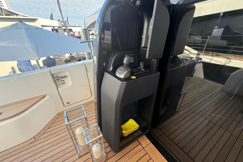  Yacht Photos Pics 2026 Cranchi 62 yacht deck with control panel and modern design elements.