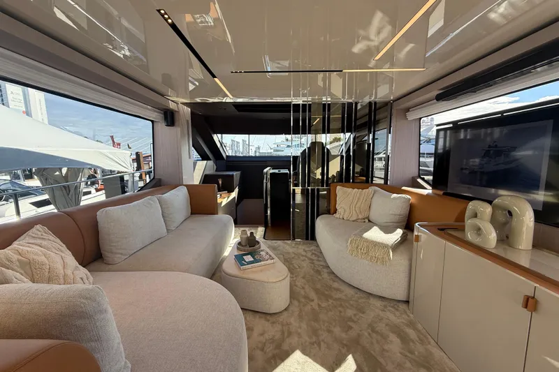  Yacht Photos Pics Luxurious interior of 2026 Cranchi 62 yacht with modern furnishings and elegant decor.