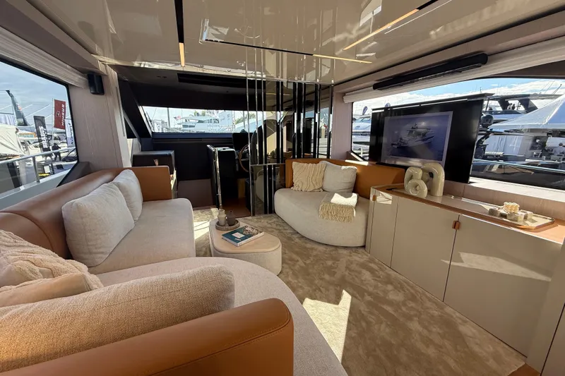  Yacht Photos Pics Luxurious interior of 2026 Cranchi 62 yacht with modern furnishings and elegant decor.