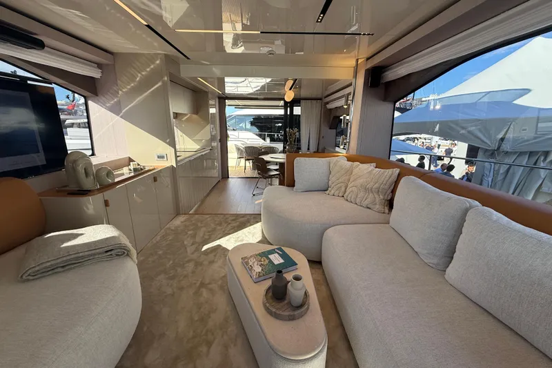  Yacht Photos Pics Luxurious interior of 2026 Cranchi 62 yacht with modern furnishings and elegant design.