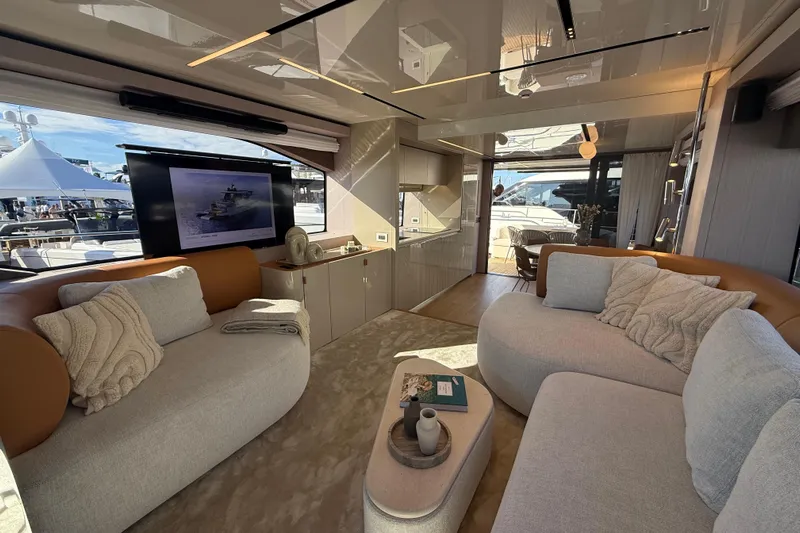  Yacht Photos Pics Luxurious interior of 2026 Cranchi 62 yacht with modern furnishings and elegant decor.