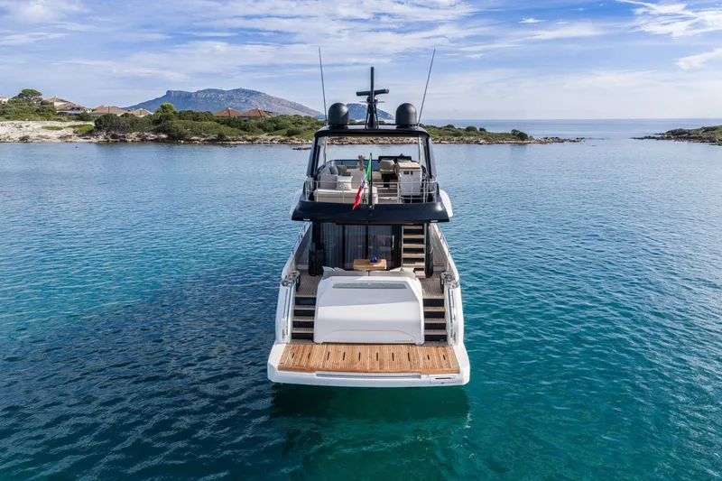  Yacht Photos Pics Luxury Cranchi 62 Sessantadue yacht on serene blue waters, 2026 model.