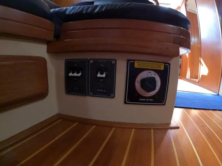Wonderwind Yacht Photos Pics Control panel on 1999 Island Packet 45 yacht with switches and engine battery dial.