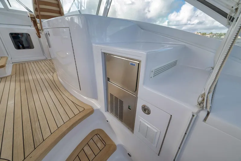 Magadi Yacht Photos Pics 2015 Ritchie Howell Express yacht interior with sleek design and wooden flooring.