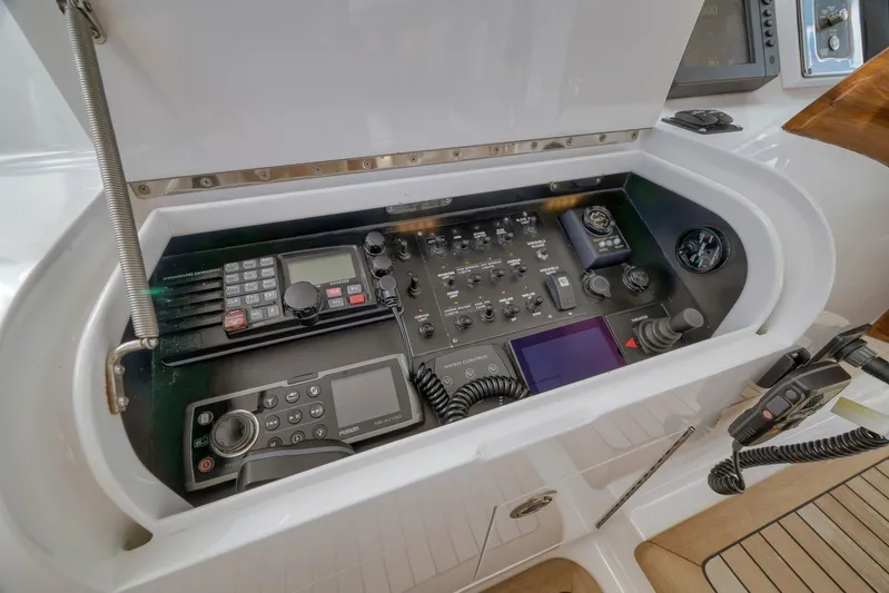 Magadi Yacht Photos Pics Control panel of a 2015 Ritchie Howell Express boat with navigation and communication equipment.