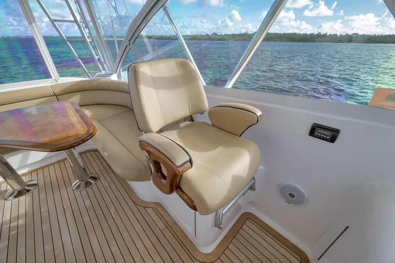 Magadi Yacht Photos Pics Luxurious 2015 Ritchie Howell Express boat interior with plush seating and scenic ocean view.