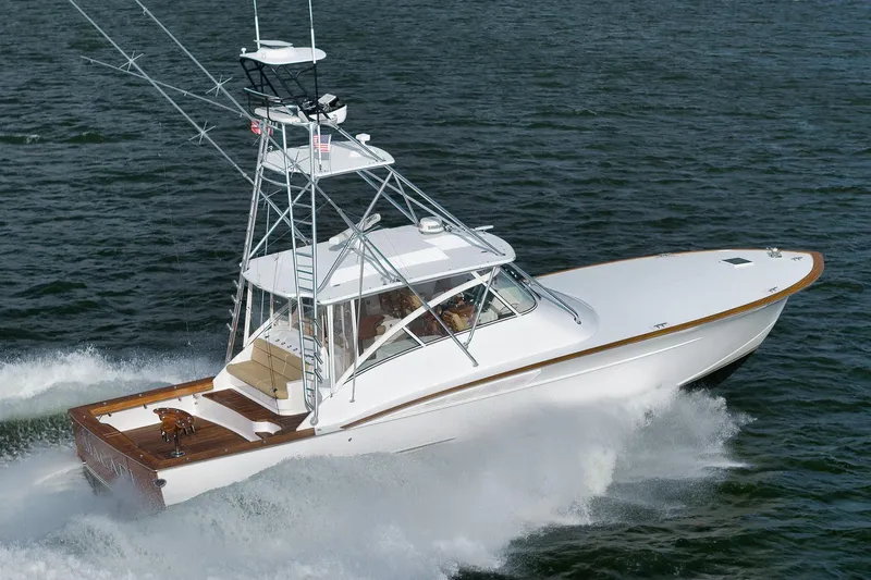 Magadi Yacht Photos Pics 2015 Ritchie Howell Express boat cruising on open water.