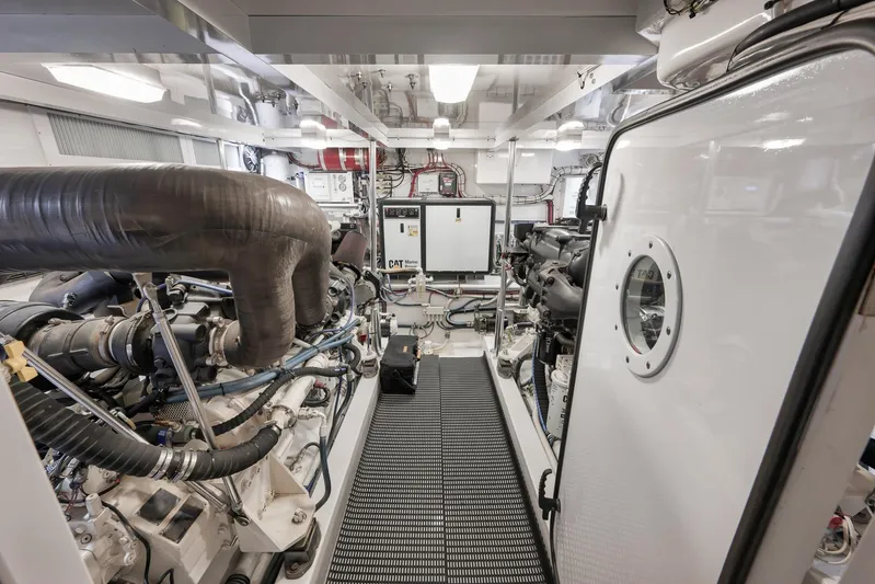 Magadi Yacht Photos Pics Engine room of 2015 Ritchie Howell Express boat, showcasing machinery and equipment.