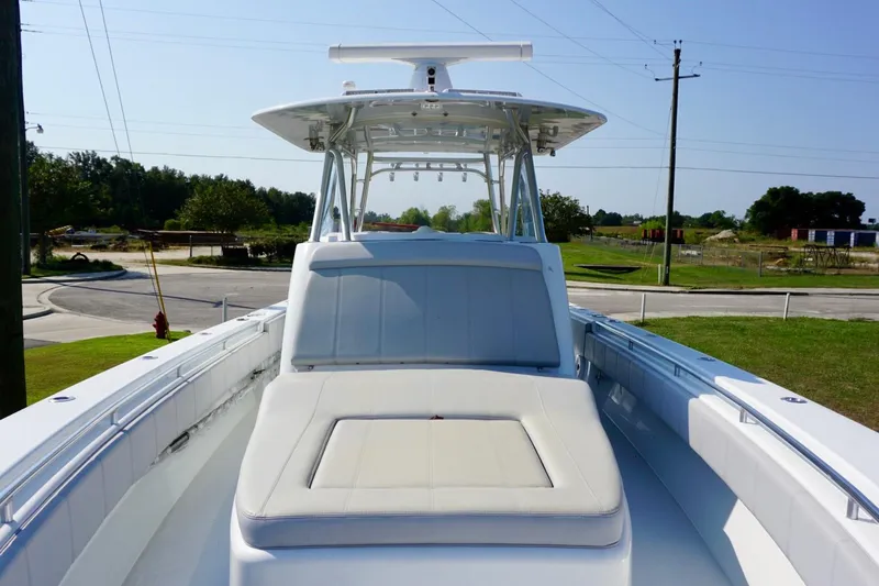  Yacht Photos Pics 2022 Contender 39 Fisharound boat with spacious deck and seating area.