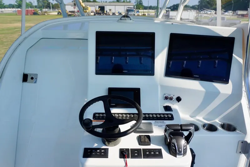  Yacht Photos Pics Helm of 2022 Contender 39 Fisharound with dual screens and controls.