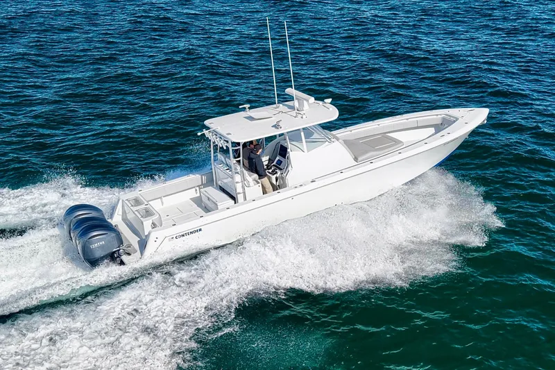  Yacht Photos Pics 2022 Contender 39 Fisharound boat cruising on open water.