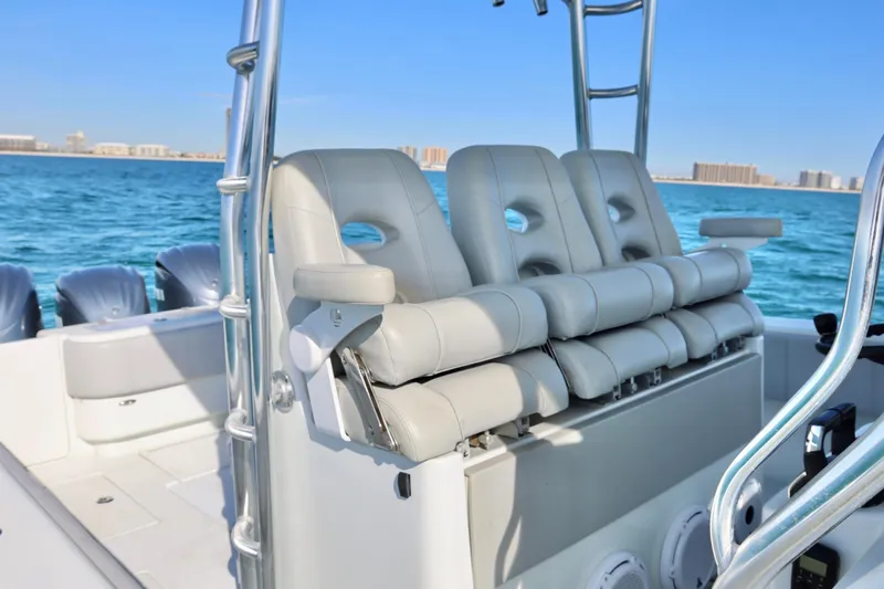  Yacht Photos Pics 2022 Contender 39 Fisharound boat with luxurious seating on a sunny day at sea.