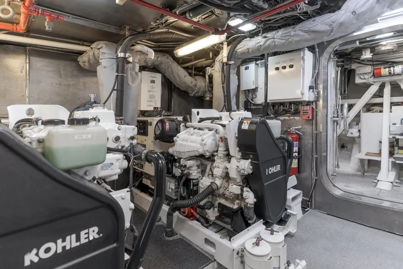 Huracan Yacht Photos Pics Engine room of 1991 Delta Marine Expedition yacht with Kohler generators and control panels.