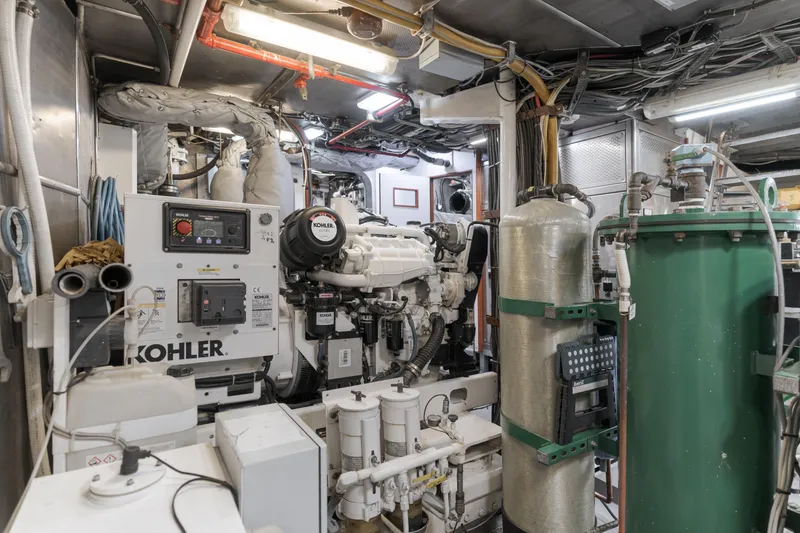 Huracan Yacht Photos Pics Engine room of 1991 Delta Marine Expedition yacht with Kohler generator and machinery.