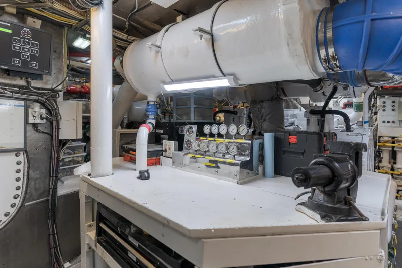 Huracan Yacht Photos Pics Engine room of 1991 Delta Marine Expedition yacht with gauges and control panels.