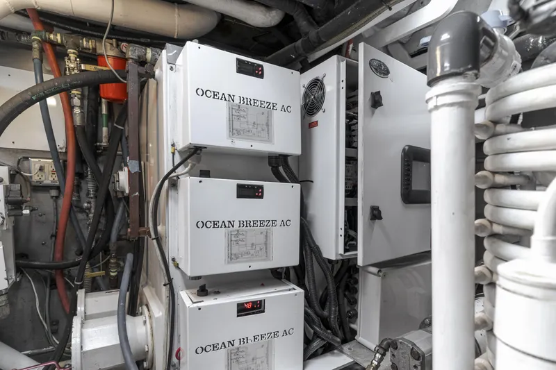 Huracan Yacht Photos Pics Engine room of 1991 Delta Marine Expedition yacht with Ocean Breeze AC units.