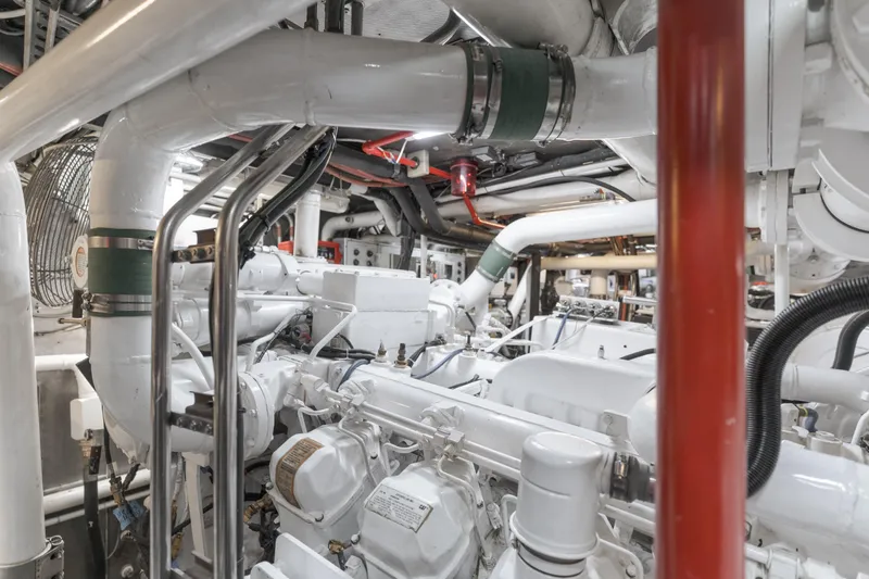 Huracan Yacht Photos Pics Engine room of 1991 Delta Marine Expedition yacht with complex piping and machinery.