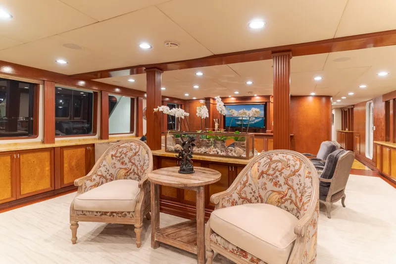 Huracan Yacht Photos Pics Luxurious interior of 1991 Delta Marine Expedition yacht with elegant seating and decor.