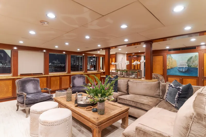 Huracan Yacht Photos Pics Luxurious interior of 1991 Delta Marine Expedition yacht with elegant seating and decor.