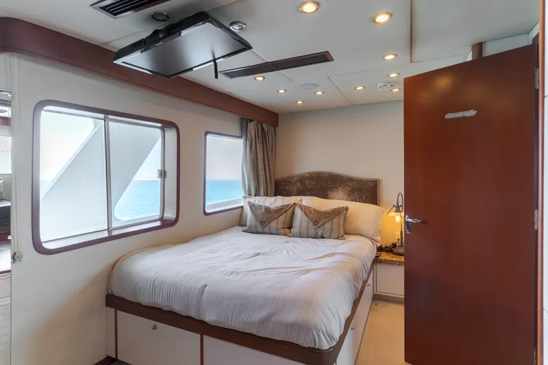 Huracan Yacht Photos Pics Luxurious cabin interior of 1991 Delta Marine Expedition yacht with ocean view.