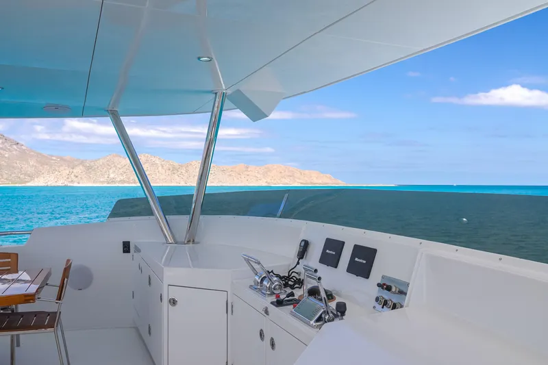 Huracan Yacht Photos Pics Luxurious Delta Marine Expedition yacht deck with ocean view, 1991 model.