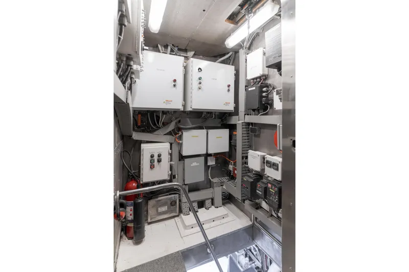 Huracan Yacht Photos Pics Engine room of 1991 Delta Marine Expedition yacht, featuring electrical panels and equipment.