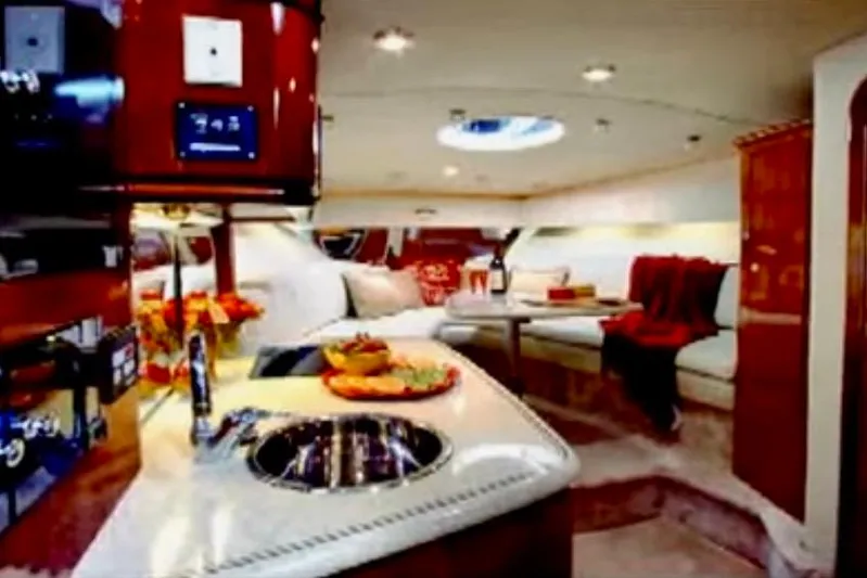  Yacht Photos Pics Luxurious interior of a 2007 Fountain 33 Sportfish Cruiser with elegant seating and modern amenities.