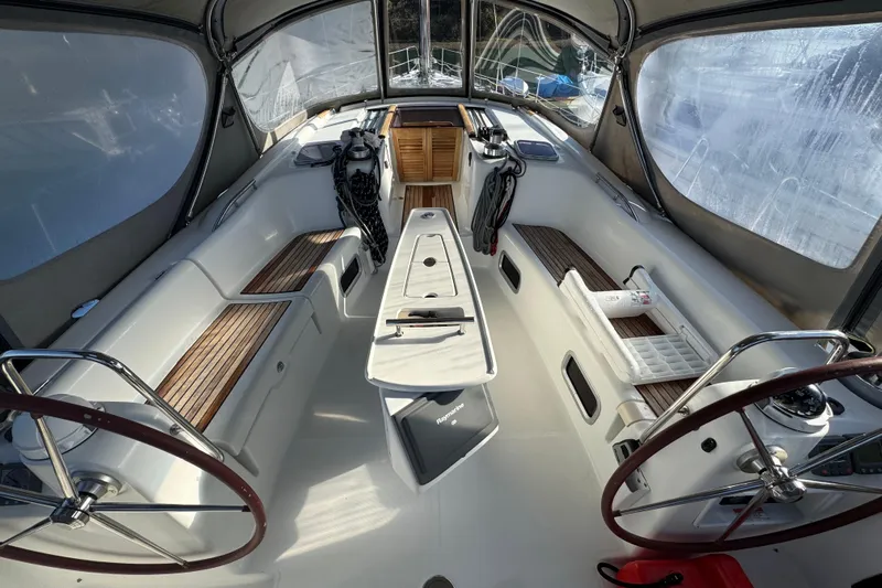 Wakadui Yacht Photos Pics Cockpit of 2009 Benetea 49 sailboat with dual steering wheels and seating.