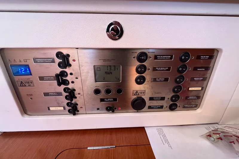 Wakadui Yacht Photos Pics Control panel of a 2009 Benetea 49 yacht, featuring various switches and indicators.