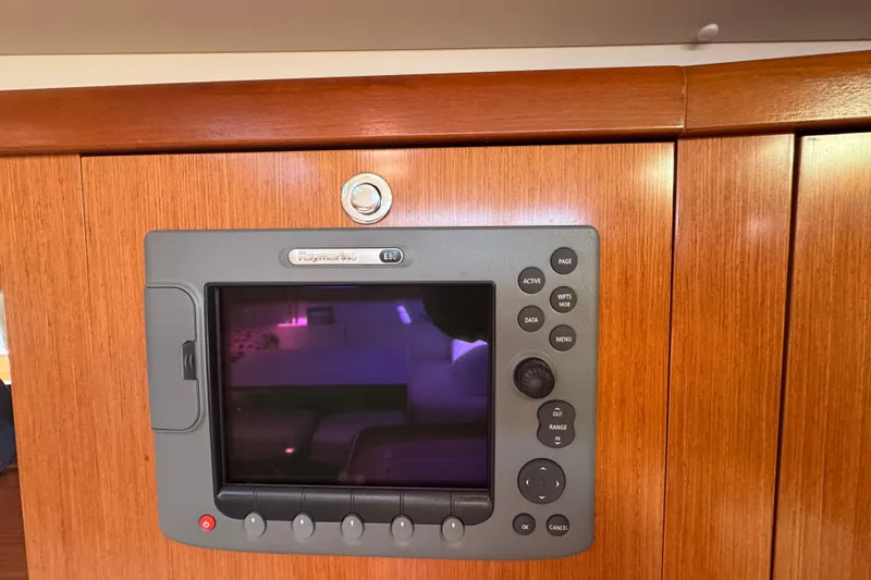Wakadui Yacht Photos Pics Raymarine E80 navigation system on 2009 Benetea 49 yacht, mounted on wooden panel.