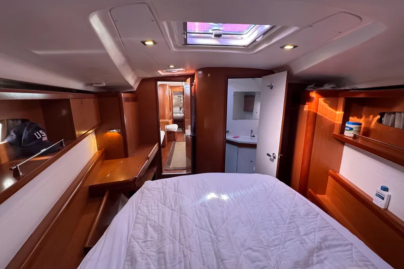 Wakadui Yacht Photos Pics Luxurious 2009 Benetea 49 yacht cabin with wood finish and natural light.