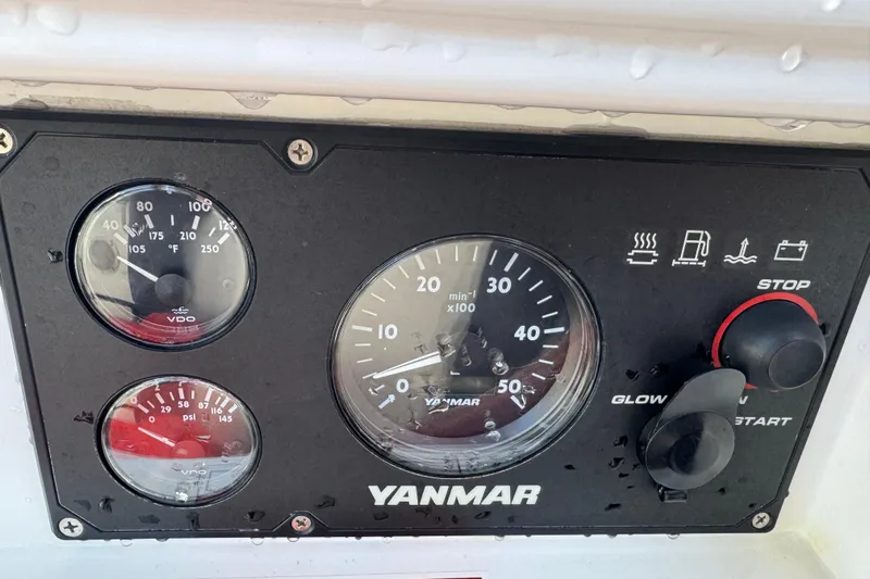 Wakadui Yacht Photos Pics Yanmar engine control panel on 2009 Benetea 49, featuring gauges and start/stop controls.