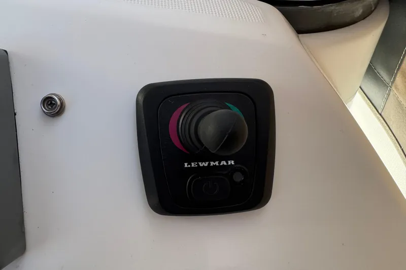 Wakadui Yacht Photos Pics Joystick control on a 2009 Benetea 49 boat dashboard.