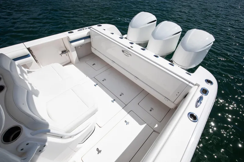  Yacht Photos Pics 2017 Intrepid 375 Center Console boat with triple engines on water.