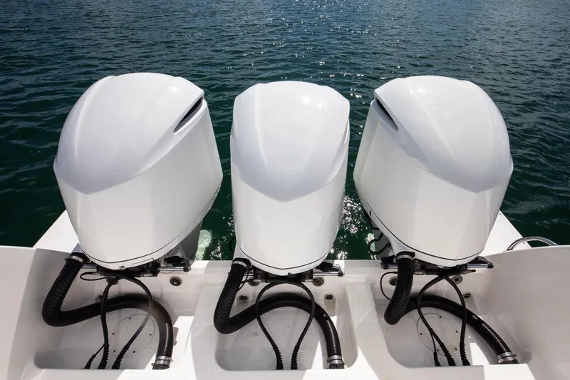  Yacht Photos Pics Three powerful outboard motors on a 2017 Intrepid 375 Center Console boat.