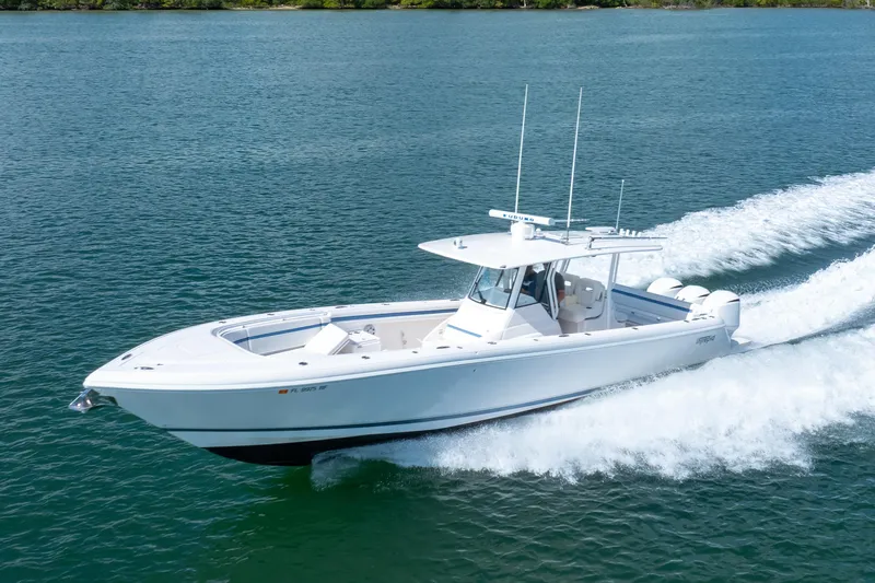  Yacht Photos Pics 2017 Intrepid 375 Center Console boat cruising on open water.