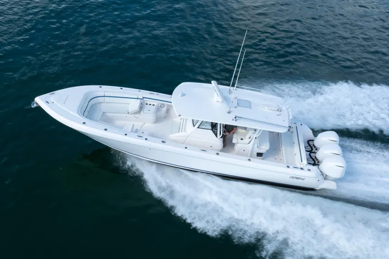  Yacht Photos Pics 2017 Intrepid 375 Center Console boat cruising on open water.