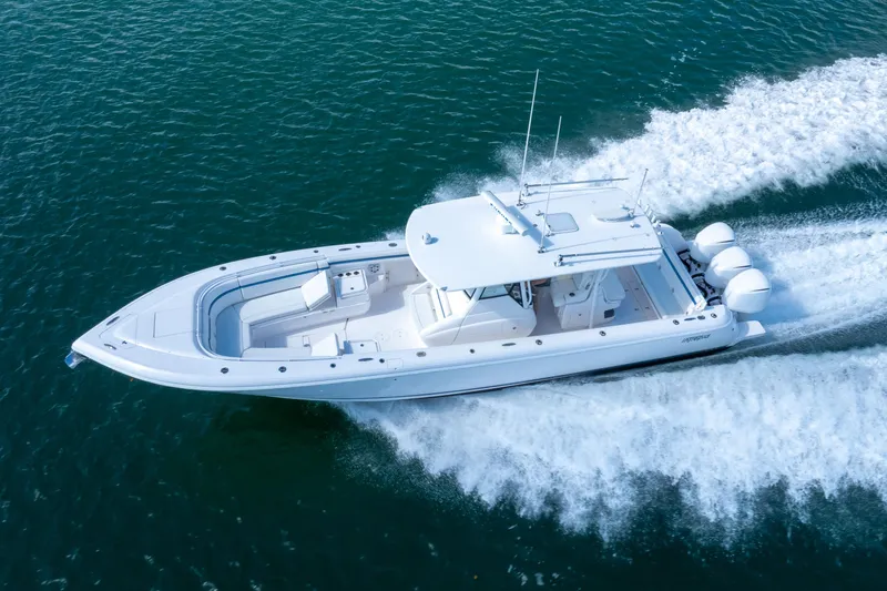  Yacht Photos Pics 2017 Intrepid 375 Center Console boat cruising on open water.