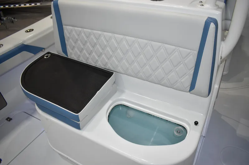 Now In Stock Yacht Photos Pics 2024 Yellowfin 34 boat interior with cushioned seating and built-in storage.