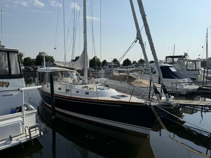  Yacht Photos Pics Sailboat Tartan 4300, 2011 model, docked at marina with other boats.