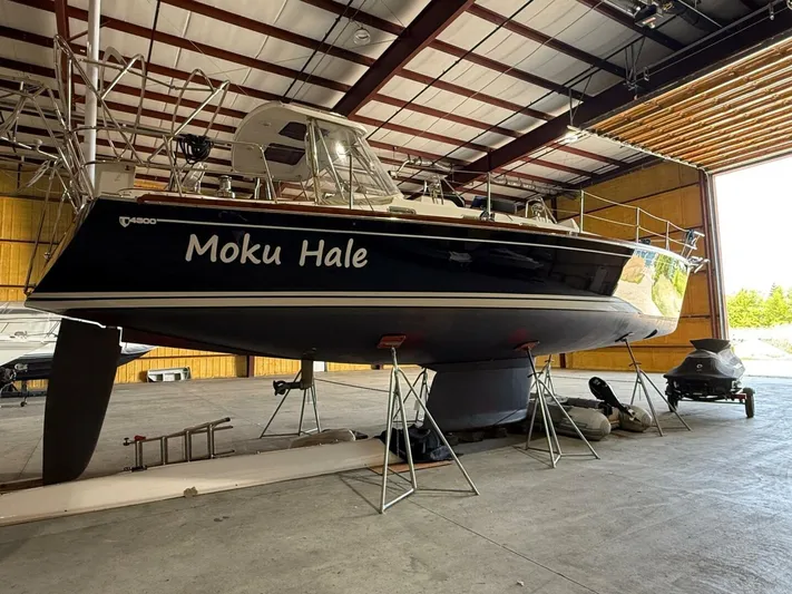  Yacht Photos Pics 2011 Tartan 4300 sailboat "Moku Hale" in a boatyard, elevated on stands.