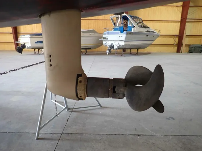  Yacht Photos Pics Close-up of a Tartan 4300 sailboat propeller in a boat storage facility.