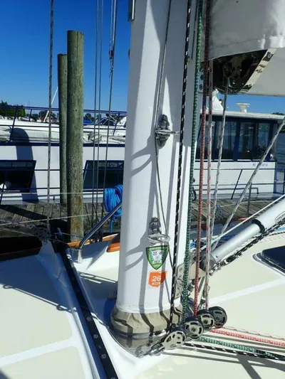  Yacht Photos Pics Sailboat deck with mast and rigging, Tartan 4300, 2011 model, docked at marina.