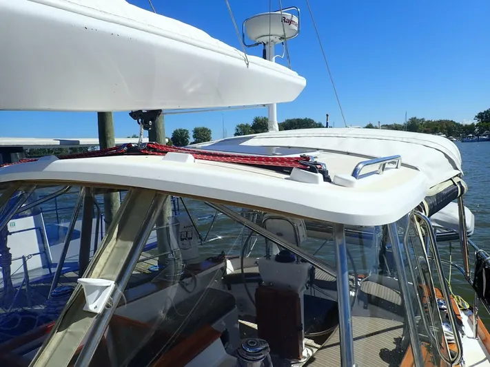  Yacht Photos Pics Sailboat Tartan 4300, 2011 model, with cockpit and rigging details, docked under clear blue sky.