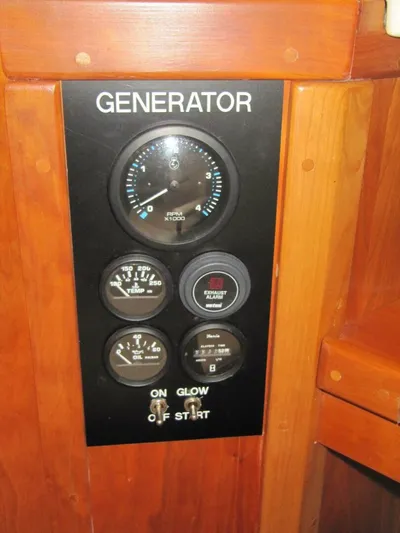  Yacht Photos Pics Generator control panel with gauges and switches on a 2011 Tartan 4300 yacht.