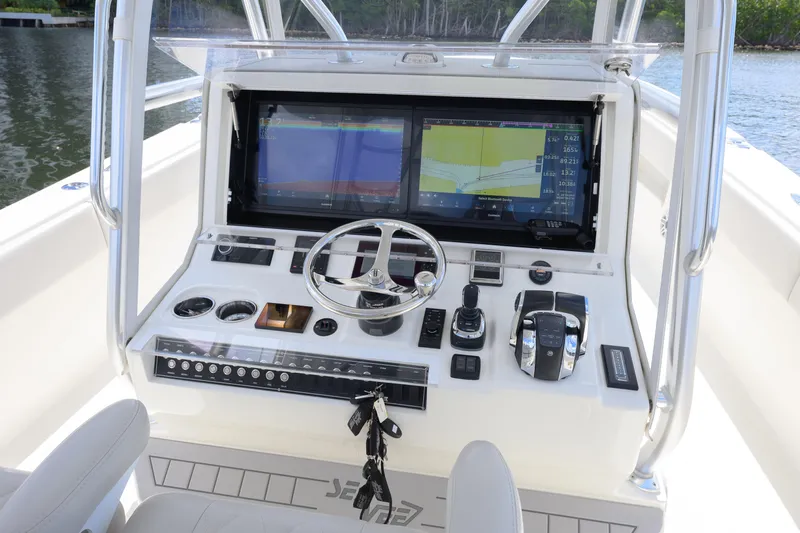  Yacht Photos Pics 2021 SeaVee 390Z boat console with dual navigation screens and steering wheel.